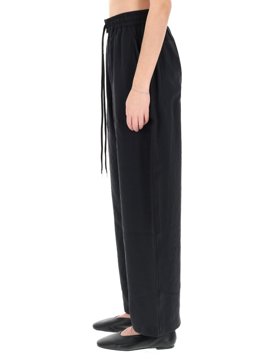 STUDIO NICHOLSON - Woman - Blue - Pants