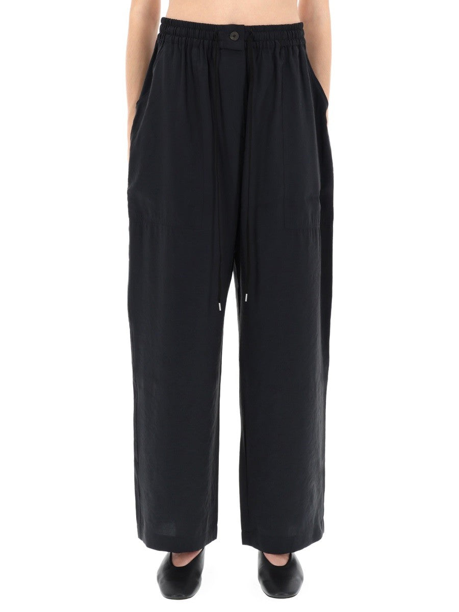 STUDIO NICHOLSON - Woman - Blue - Pants
